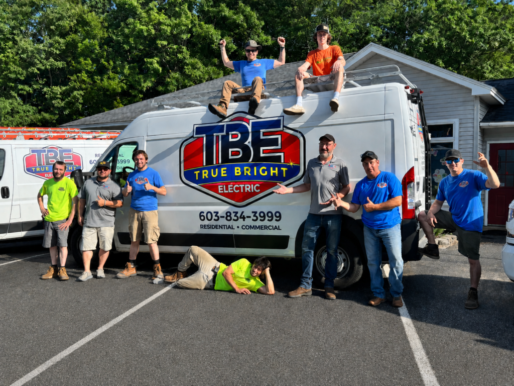 True Bright Electric crew in front of a branded service van, Dover, New Hampshire